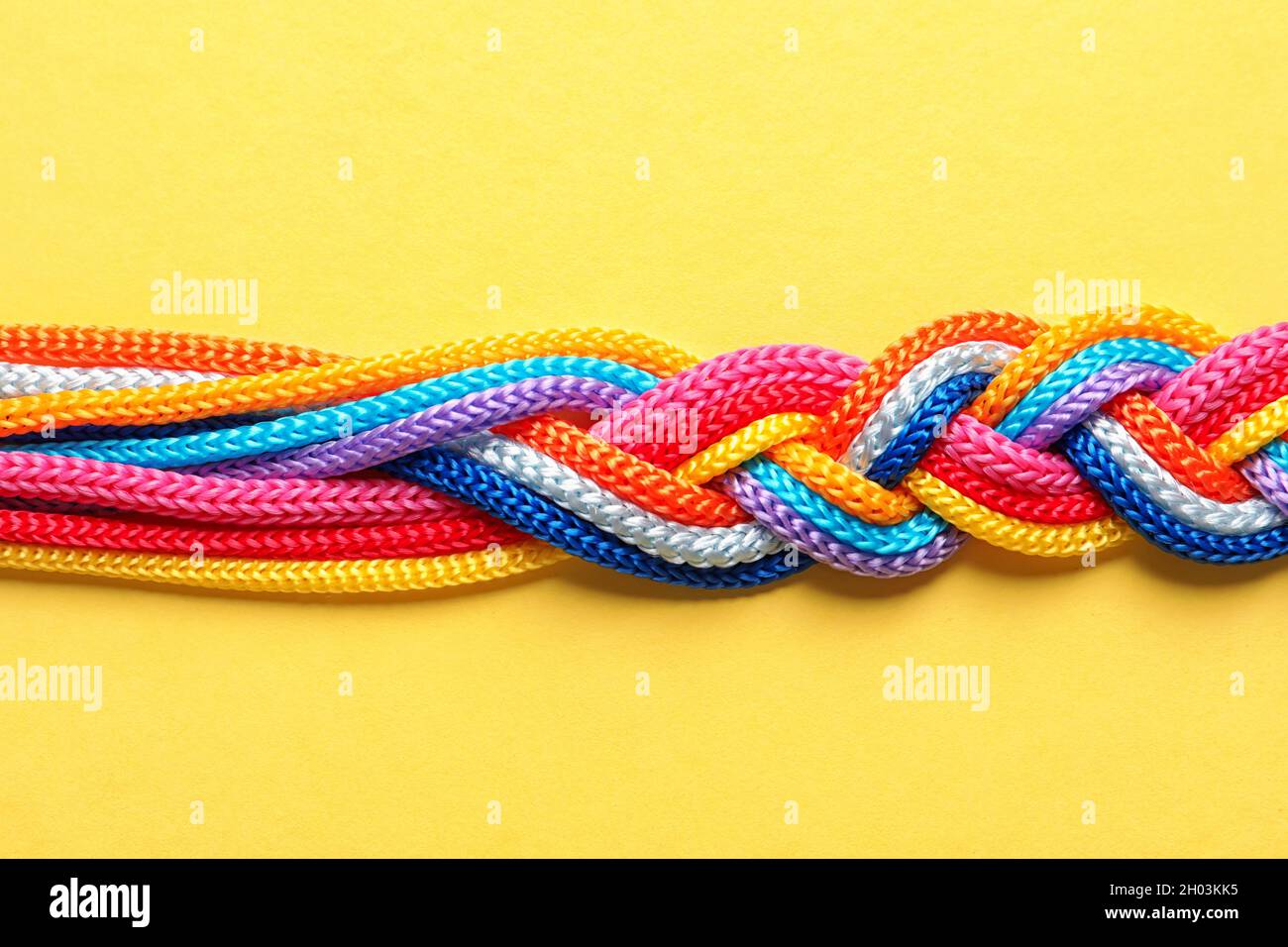Braided ropes on color background, top view. Unity concept Stock Photo ...