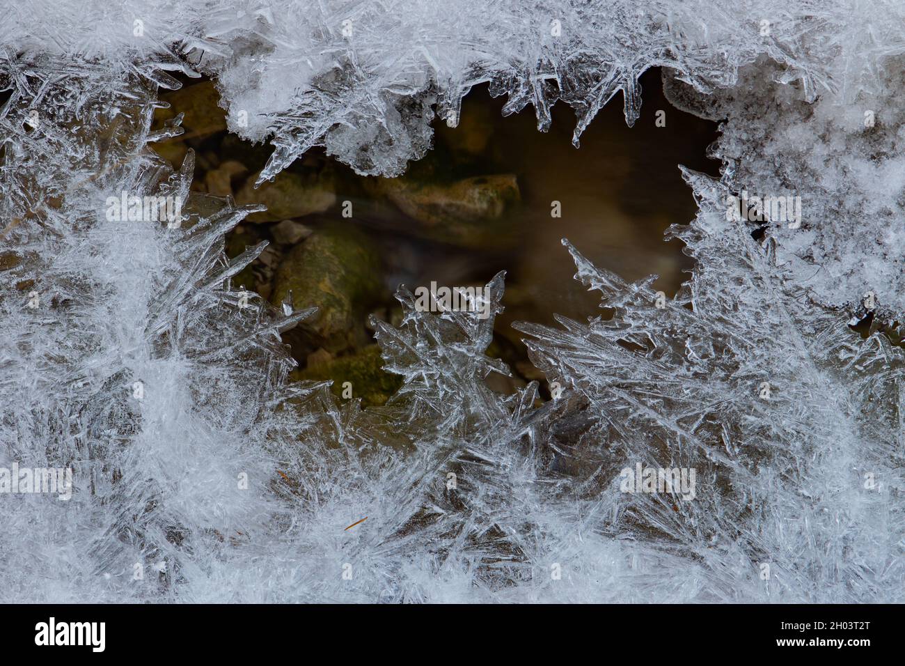 Ice spike crystal structure over rocks Stock Photo Alamy