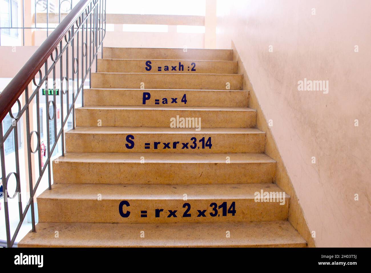 Ho Chi Minh City, Vietnam - Sep 17, 2016: Stairs with mathematical formulas in an elementary school Stock Photo