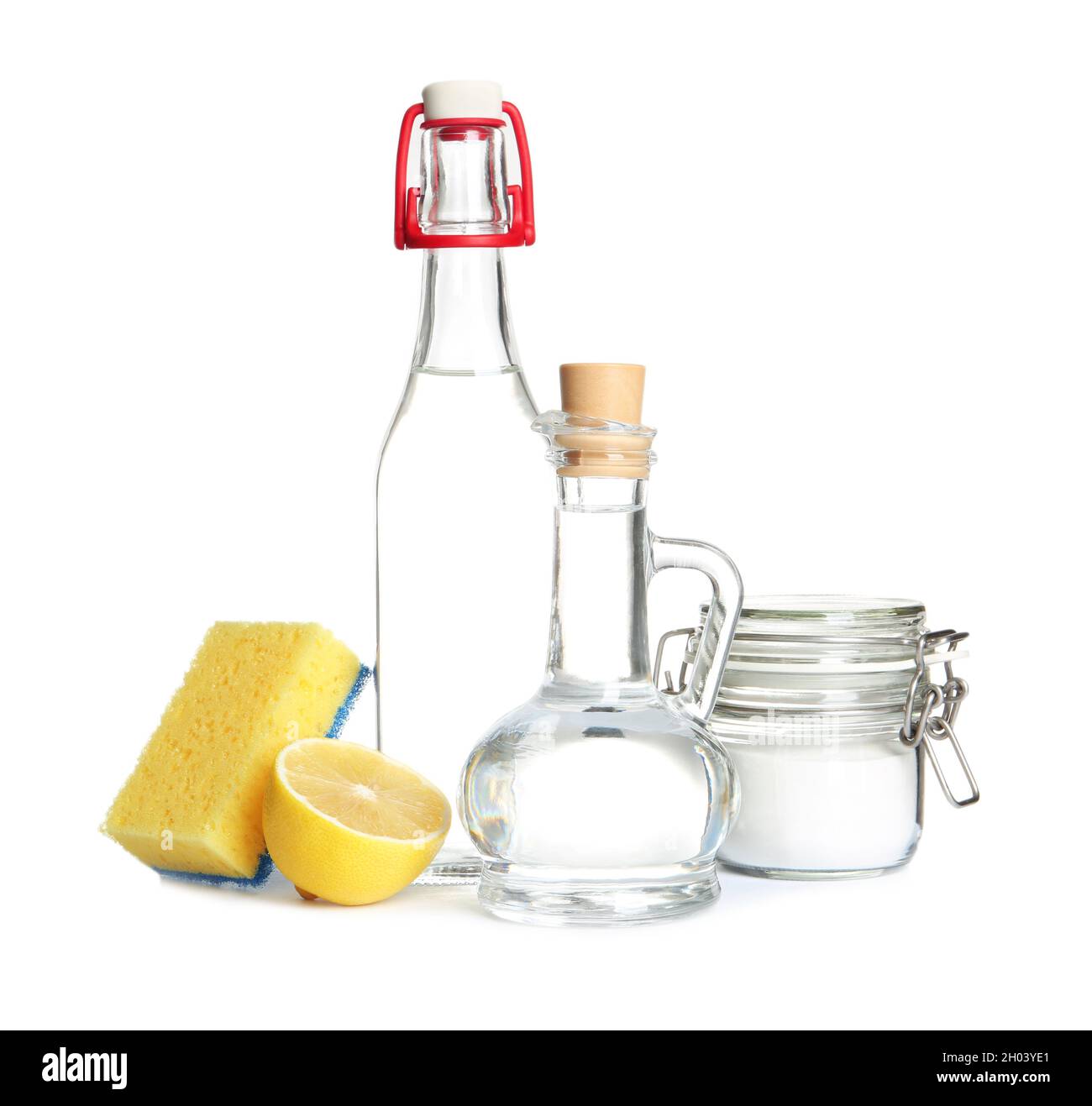 Composition with vinegar, lemon and baking soda on white background