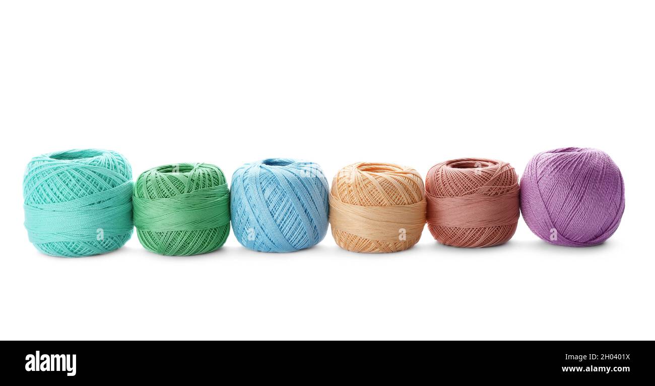 Light Colour Threads Color threads on white background Stock Photo - Alamy