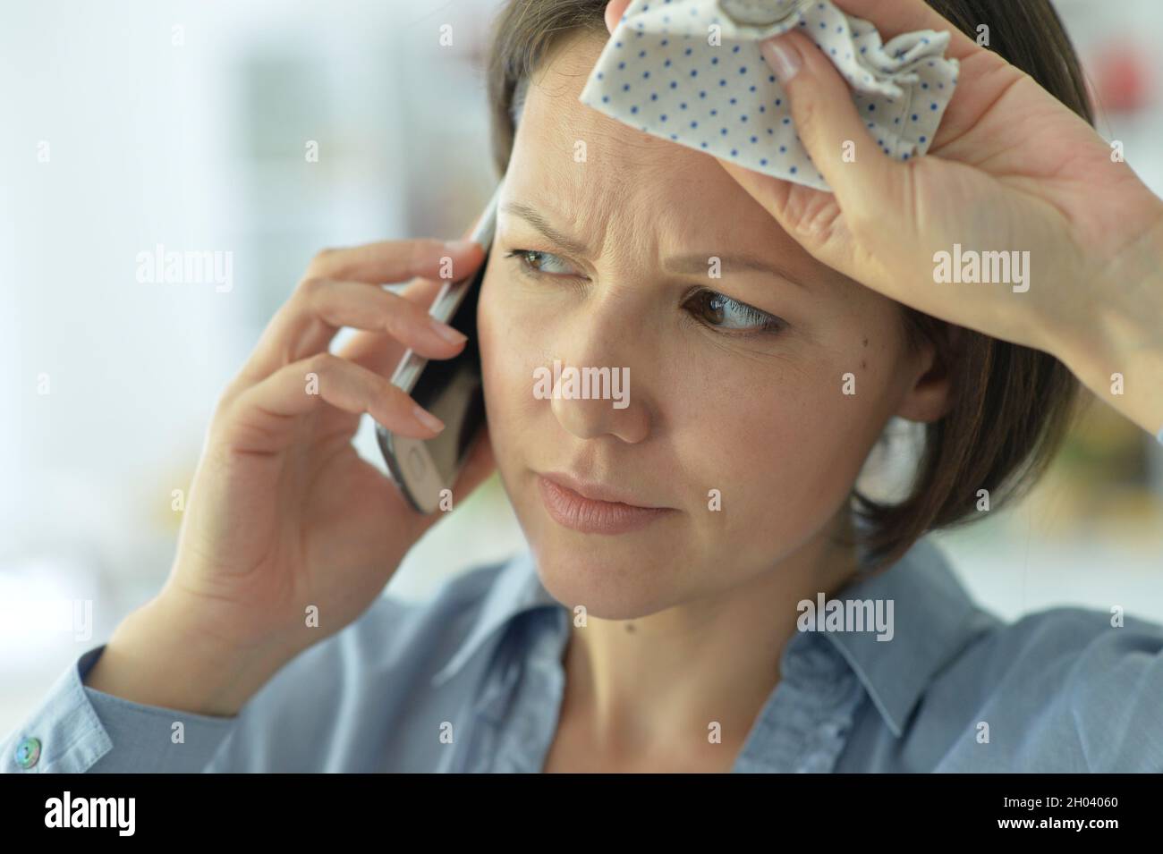 portrait of a young woman talking on the phone Stock Photo