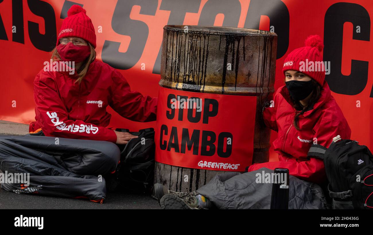London, UK. 11th Oct, 2021. Greenpeace activists protesting about Cambo oil block Whitehall outside Downing Street London Credit: Ian Davidson/Alamy Live News Stock Photo