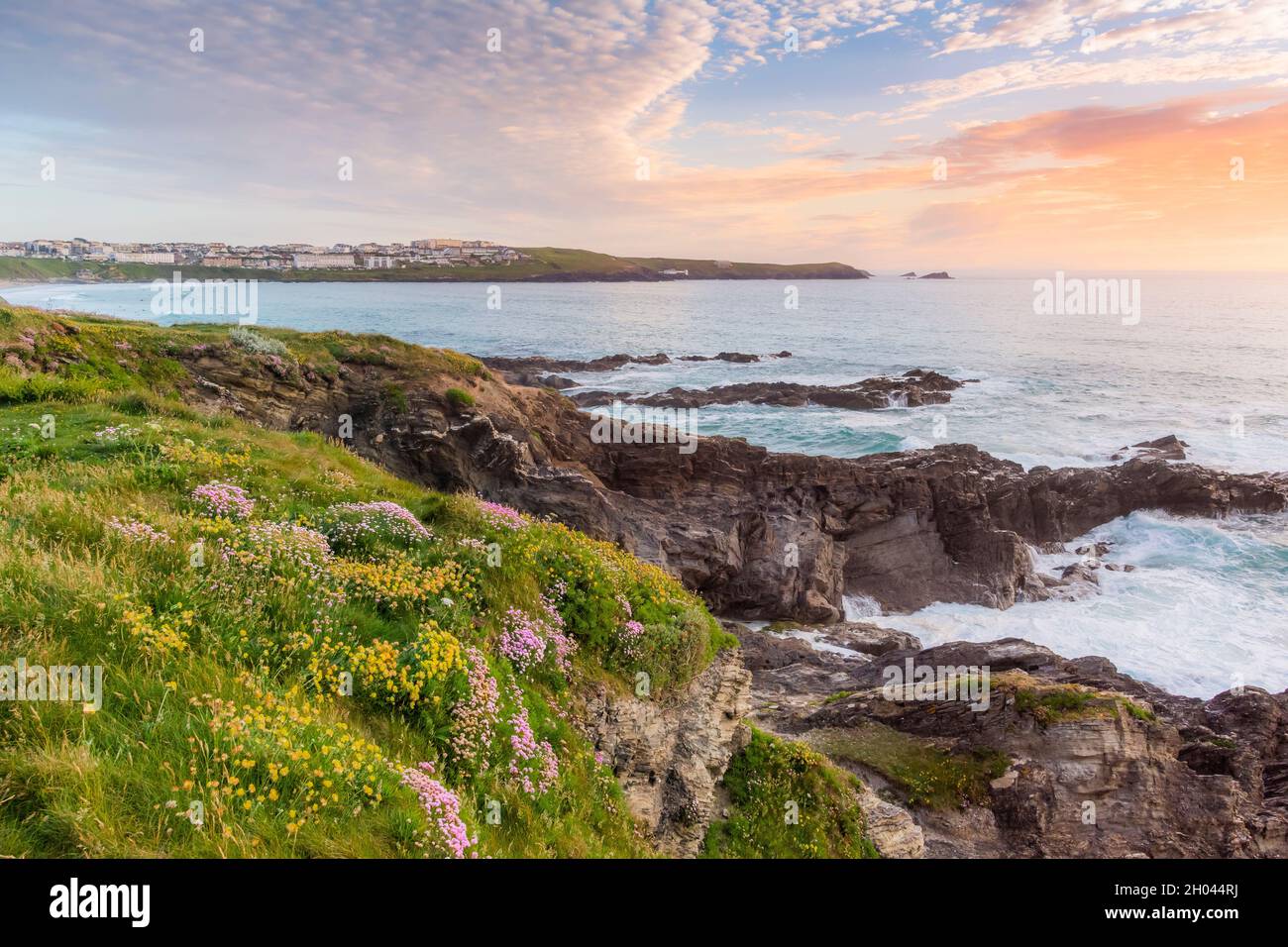 Evening light over Fistral Bay on the coast of Newquay in Cornwall. Stock Photo