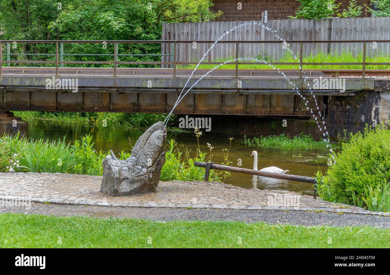 Fish sculptures in front of a bridge at Fischen im Allgaeu, a municipality in the district of Oberallgaeu in Germany Stock Photo