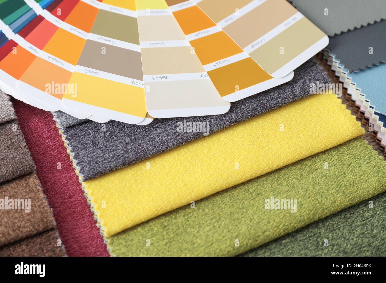 Upholstery fabric samples and color palette, closeup. Interior design