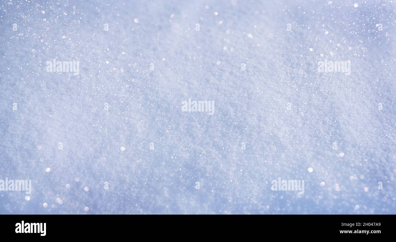 Winter time background of glittering fresh snow. Stock Photo