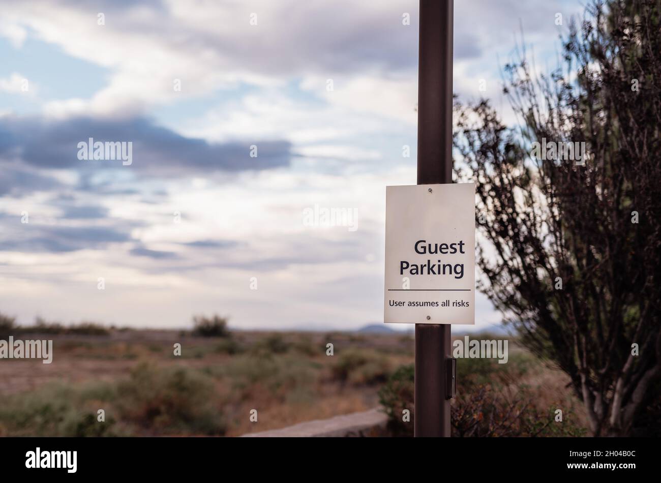 'Guest Parking' sign on the metal pole, Deming, New Mexico Stock Photo