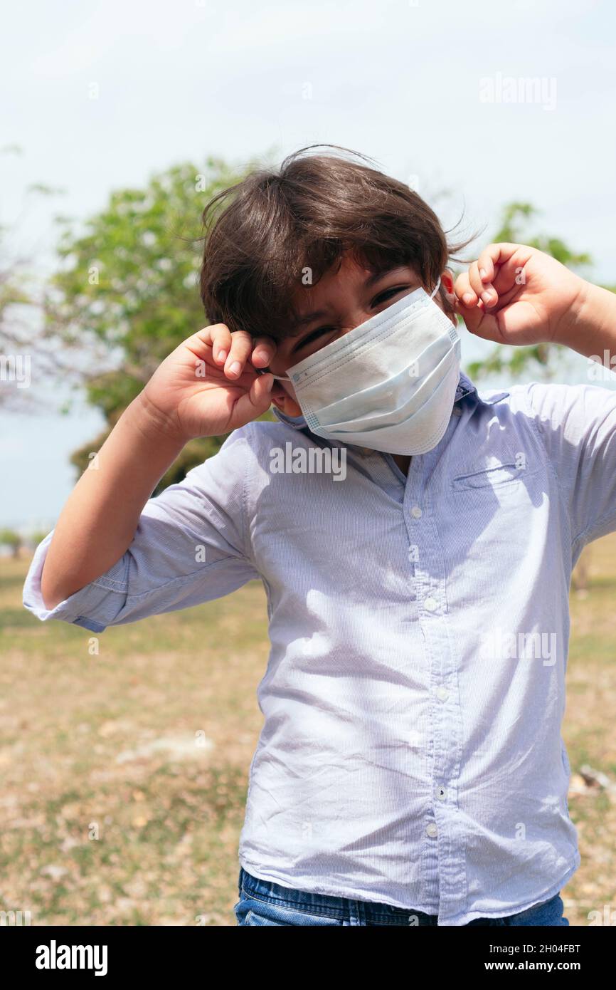 Child with protective mask hi-res stock photography and images - Alamy