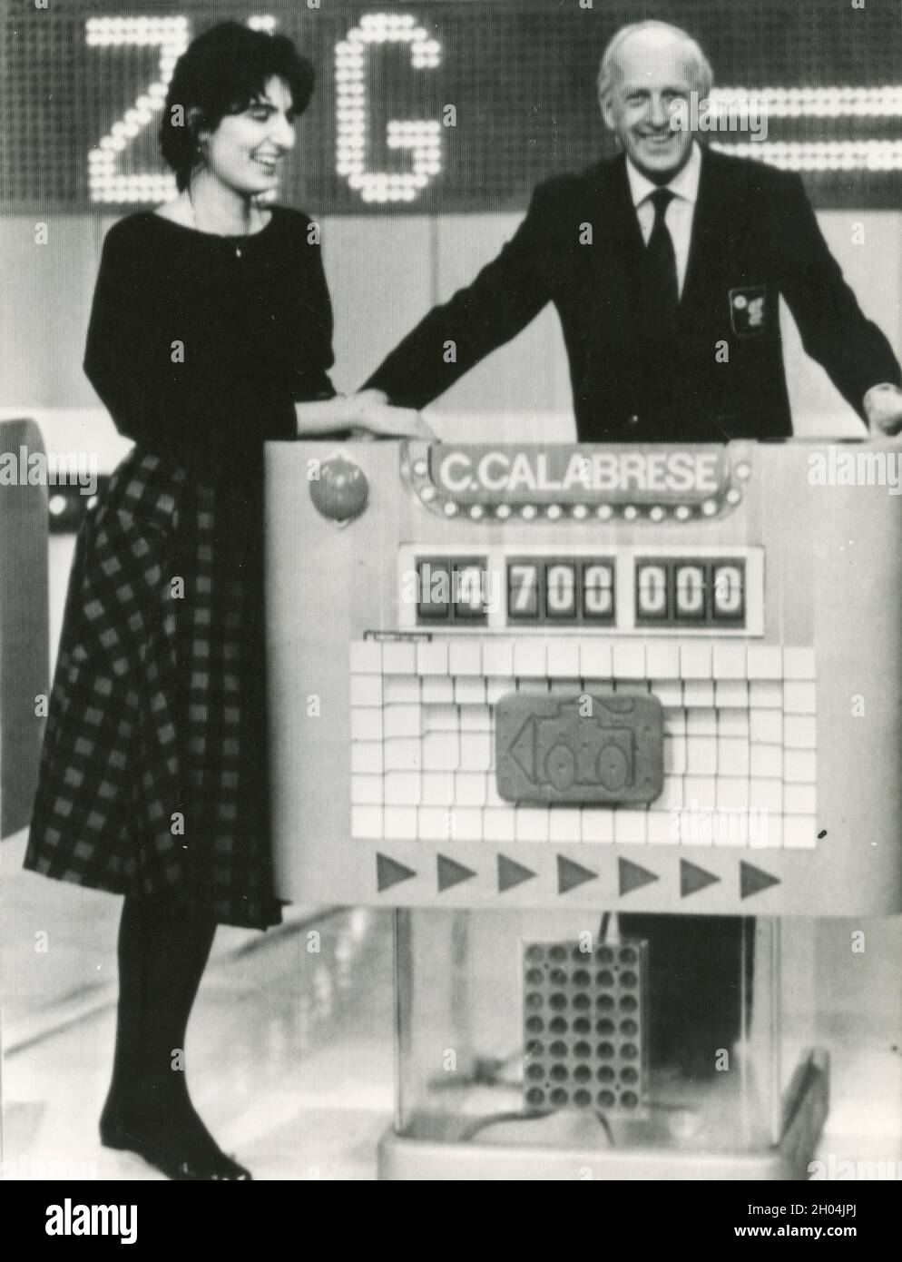 Italian actor and TV host Raimondo Vianello with the winner of the game Cristina Calabrese, 1985 Stock Photo