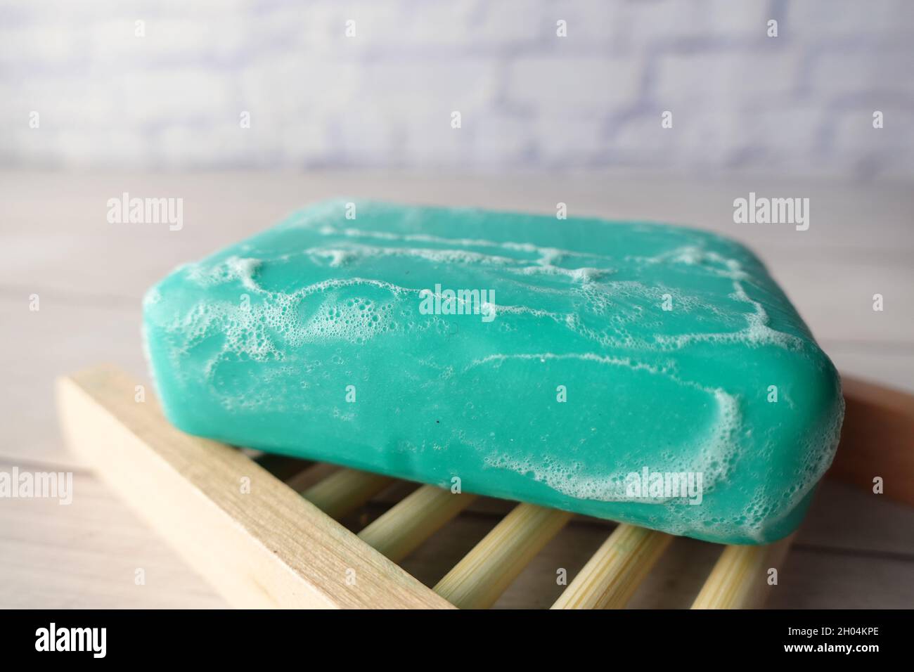 Soap and bubbles on a case on table  Stock Photo