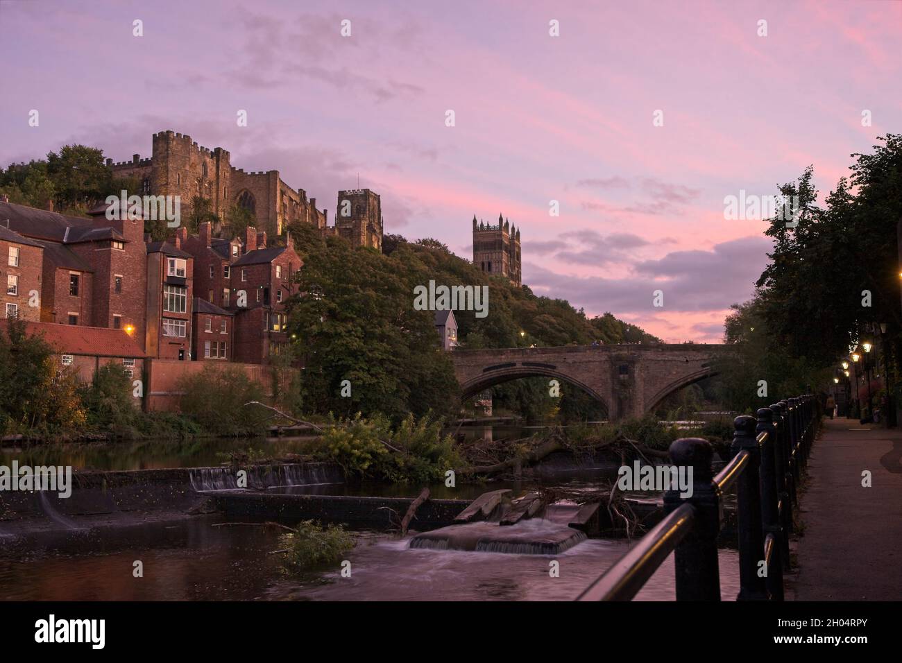 Durham Castle and Cathedral captured from the riverside footpath along the River Wear looking towards Framwellgate Bridge. Stock Photo
