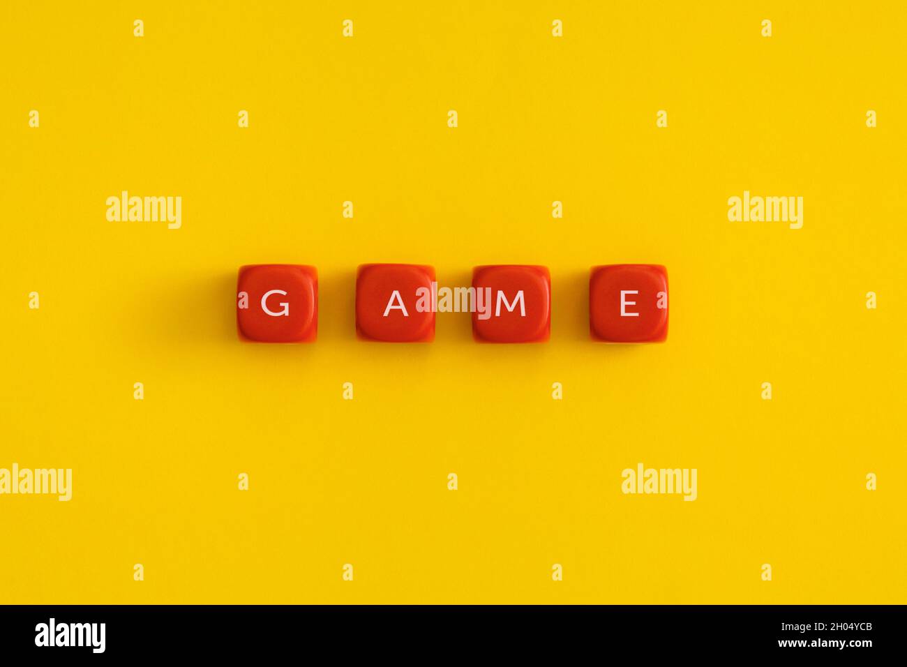 The word "Game" on a red cubes Stock Photo