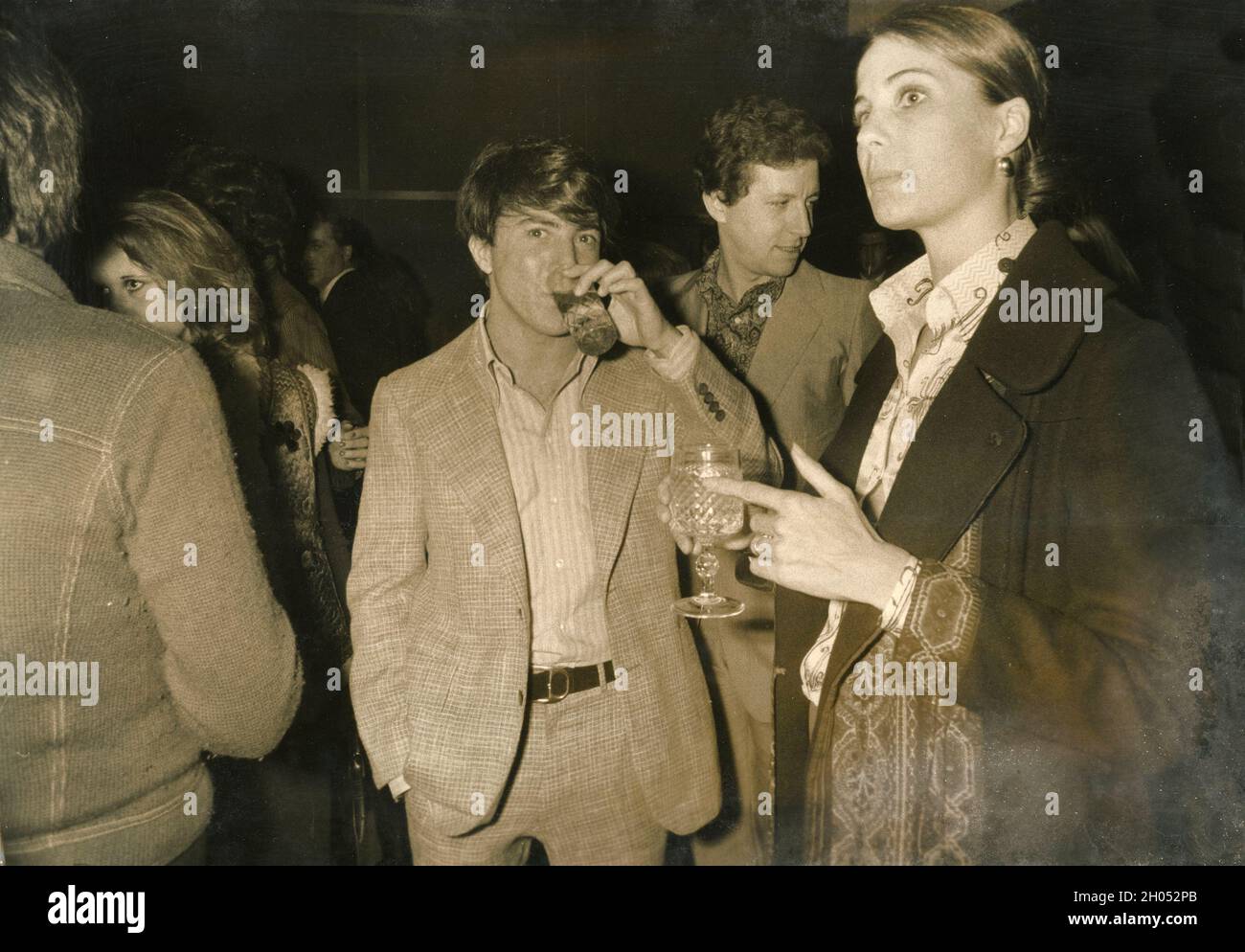 American actor and filmmaker Dustin Hoffman and wife Anne Byrne at a party, 1970 Stock Photo