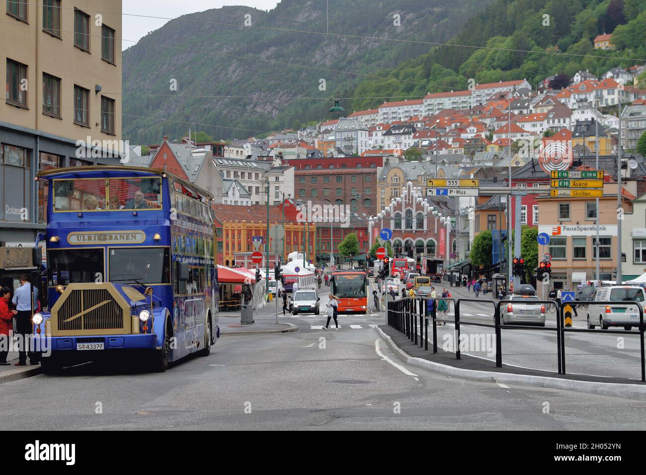 Bergen, Norway - Jun 13, 2012: Tourist bus on city street Stock Photo