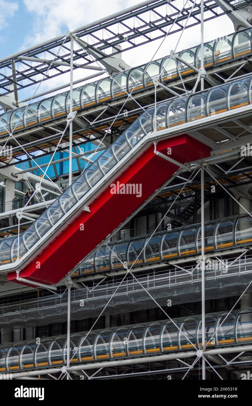 Paris, France, September 2021. Detail of the front façade of the famous Centre Pompidou building with its technological aesthetics and red staircase Stock Photo