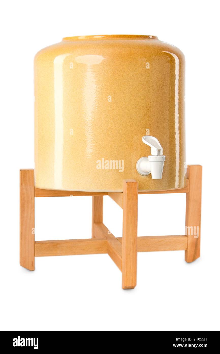 ceramic water bottle cooler on wooden stand Stock Photo Alamy