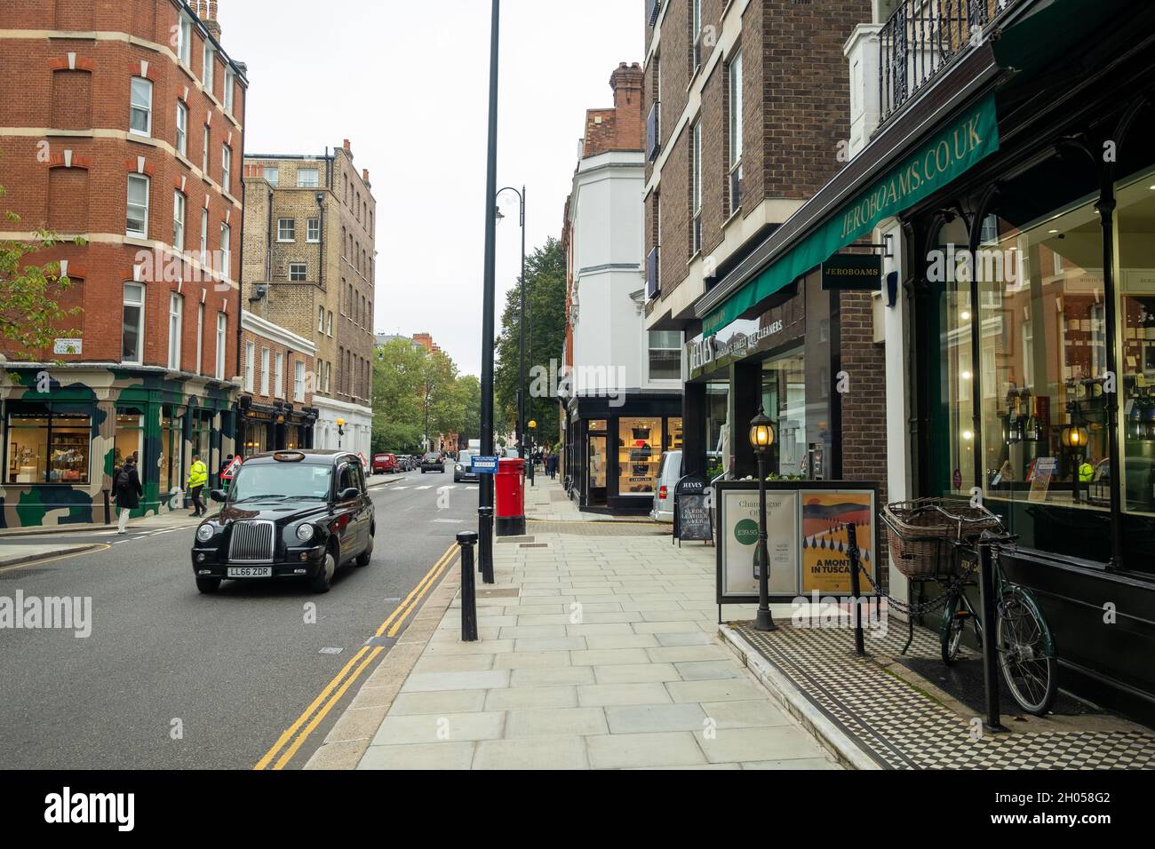 LONDON- MAY, 2018: Shops of Knightsbridge scene, an upmarket area of shops and restaurants Stock Photo