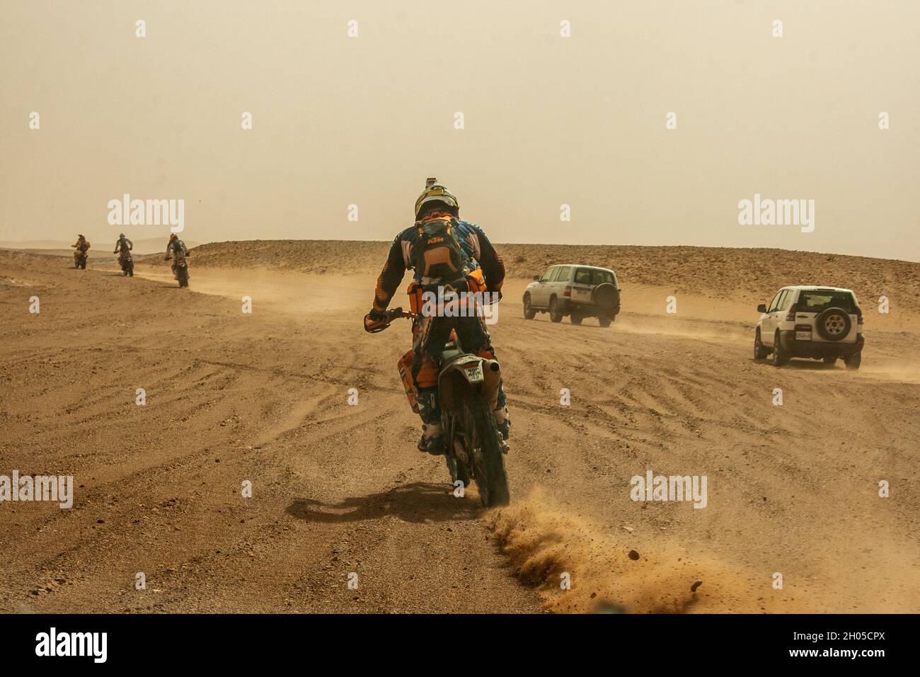 Extreme tourism. off road motorbikes and 4 wheel drive vehicles Photographed in Morocco Stock Photo