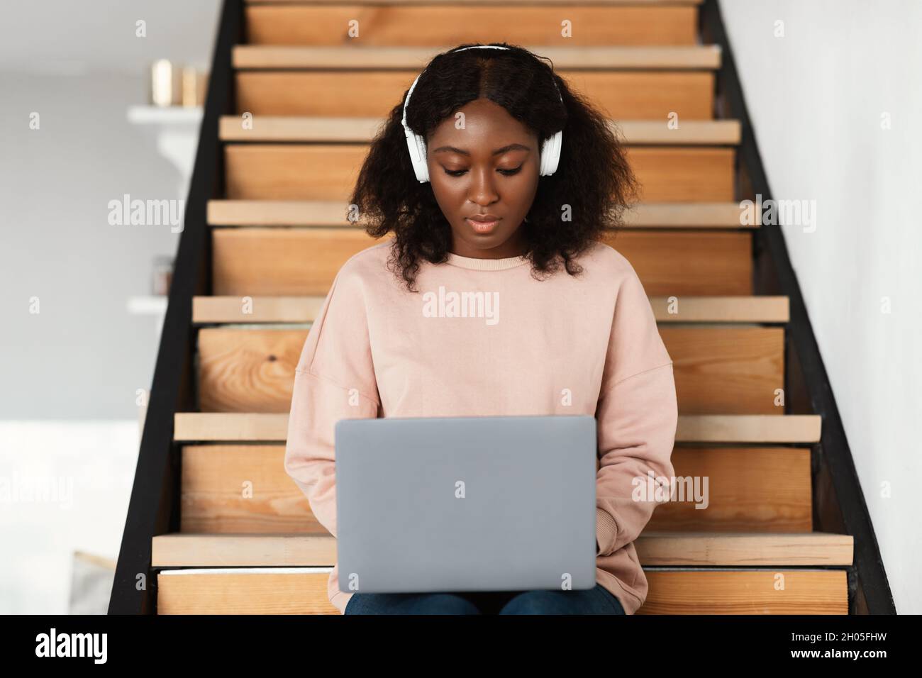 Serious Black Female Freelancer Working On Laptop Online Wearing ...