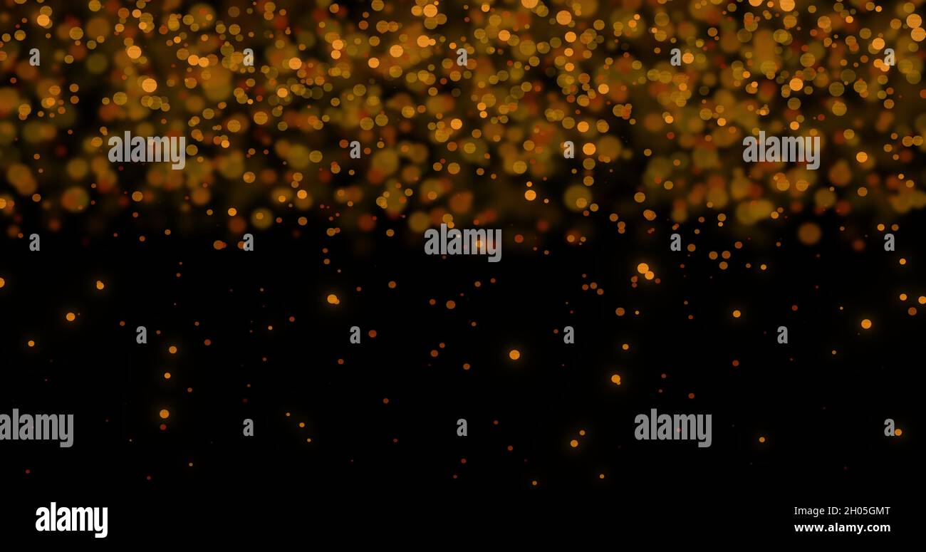 Image of multiple glowing gold spots of light moving in hypnotic motion