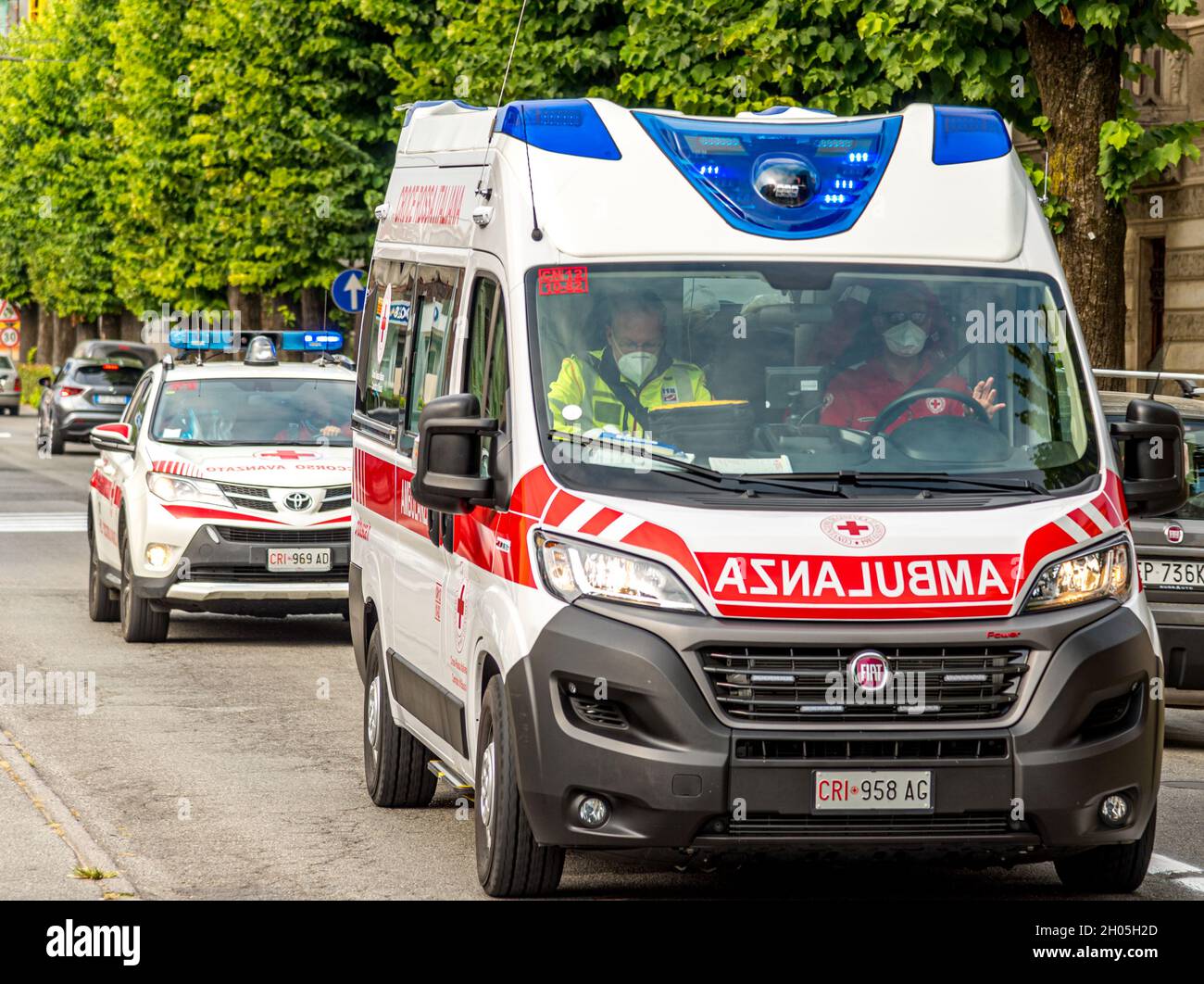 Savigliano, Cuneo, Italy - September 2, 2021: Ambulance of the Italian Red Cross with following car for advanced rescue in first aid Stock Photo
