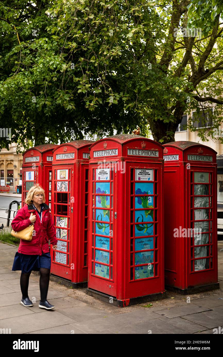 UK, Gloucestershire, Cheltenham, The Promenade, ‘Art Boxes’, six refurbished K6 red phone boxes, installation by Geraham Tait Stock Photo