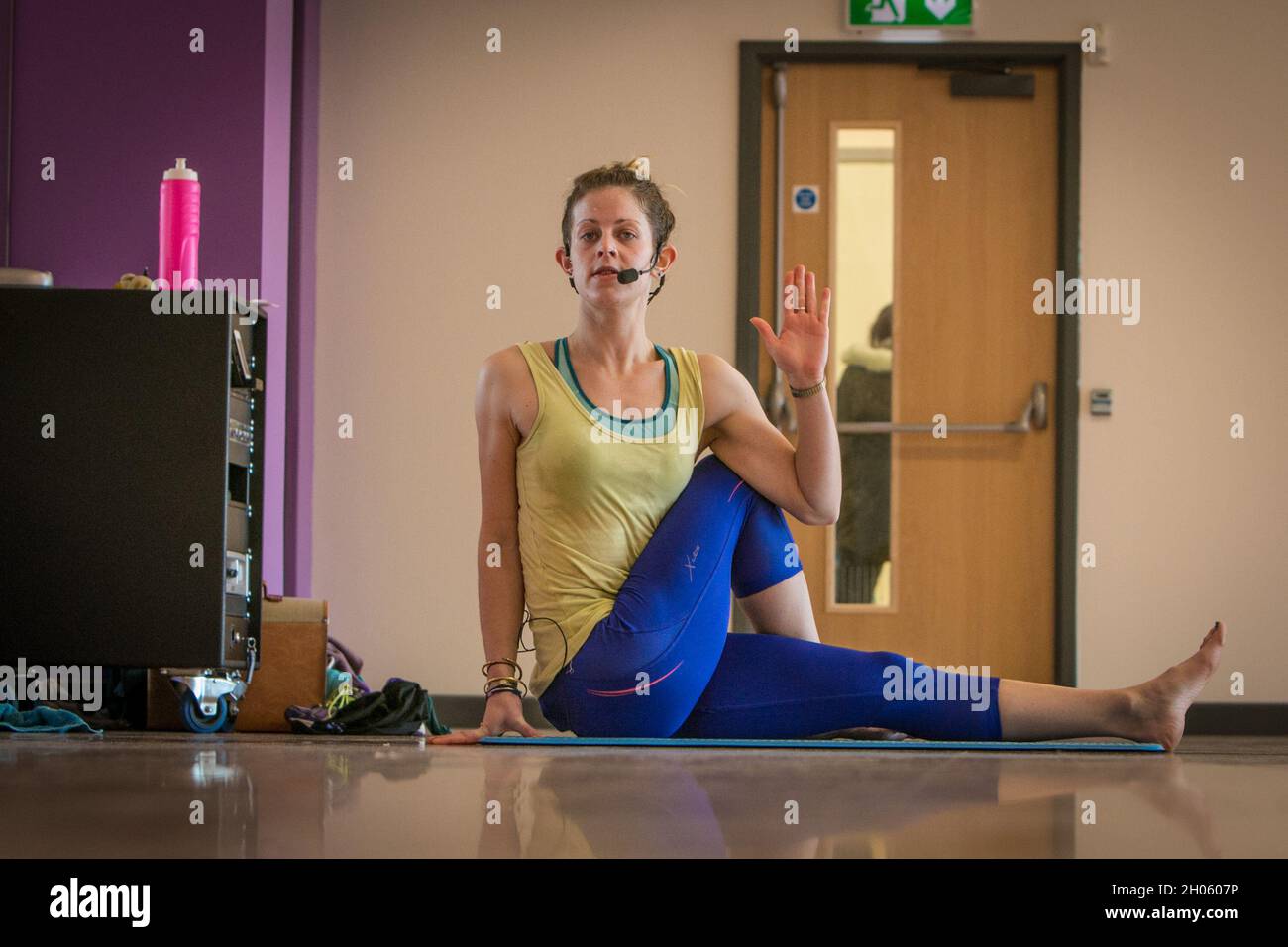 Yoga teacher in a Leisure Centre Stock Photo