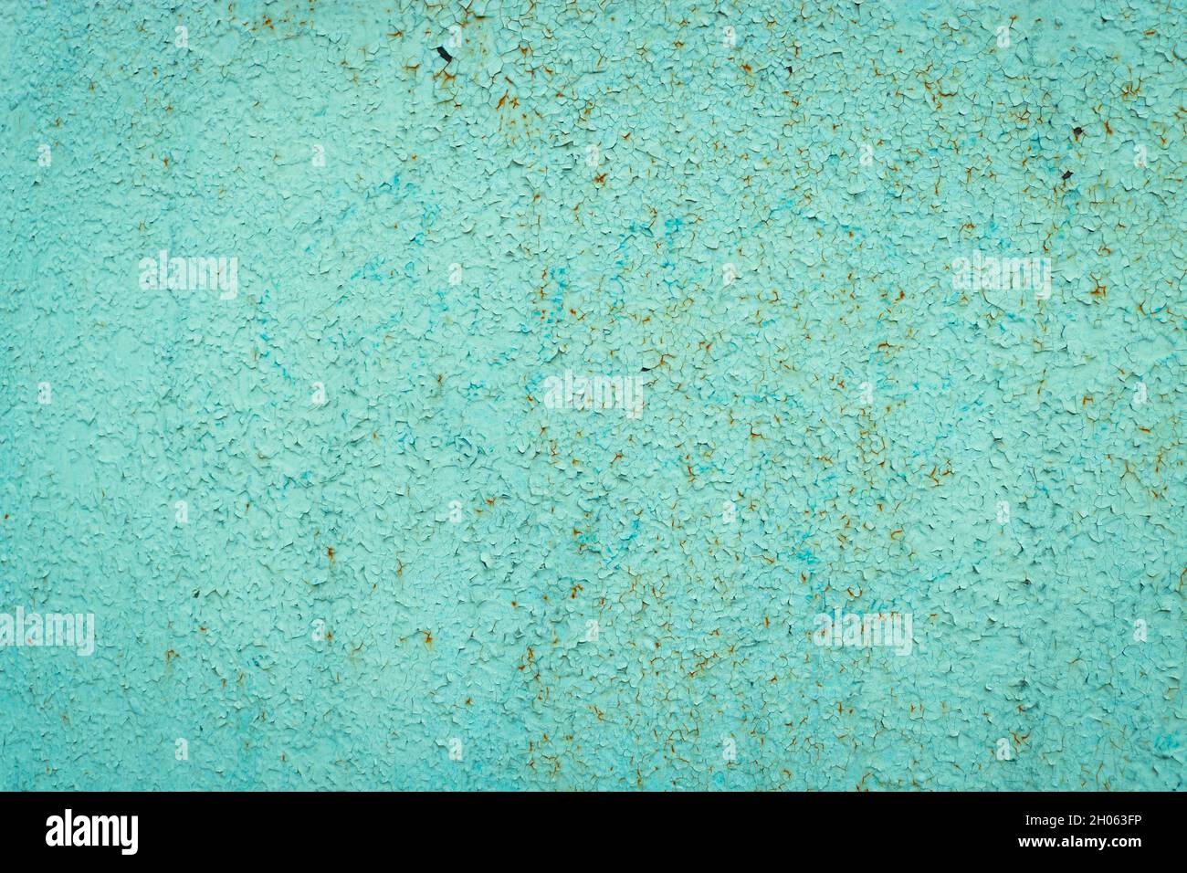 Cracked paint and rusty metal background. Stock Photo