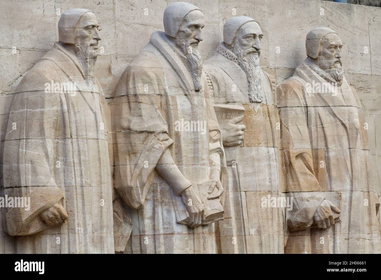 Reformation Wall (1909): William Farel, John Calvin, Theodore Beza, and John Knox - detail - Geneva - Switzerland Stock Photo