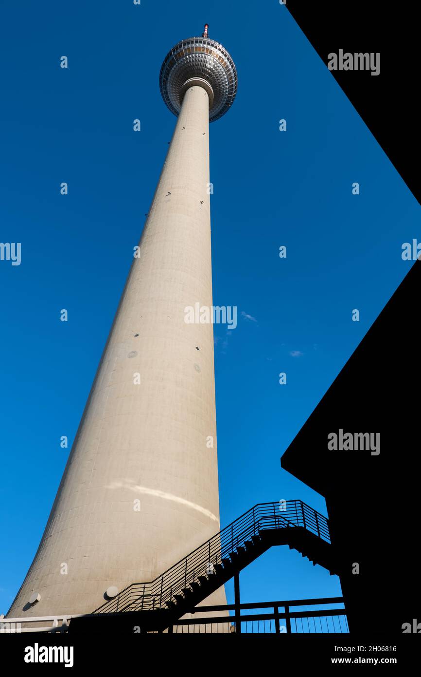 Germany, city of Berlin, Berliner Fernsehturm Television Tower abstract view with silhouette of a structure below. Stock Photo