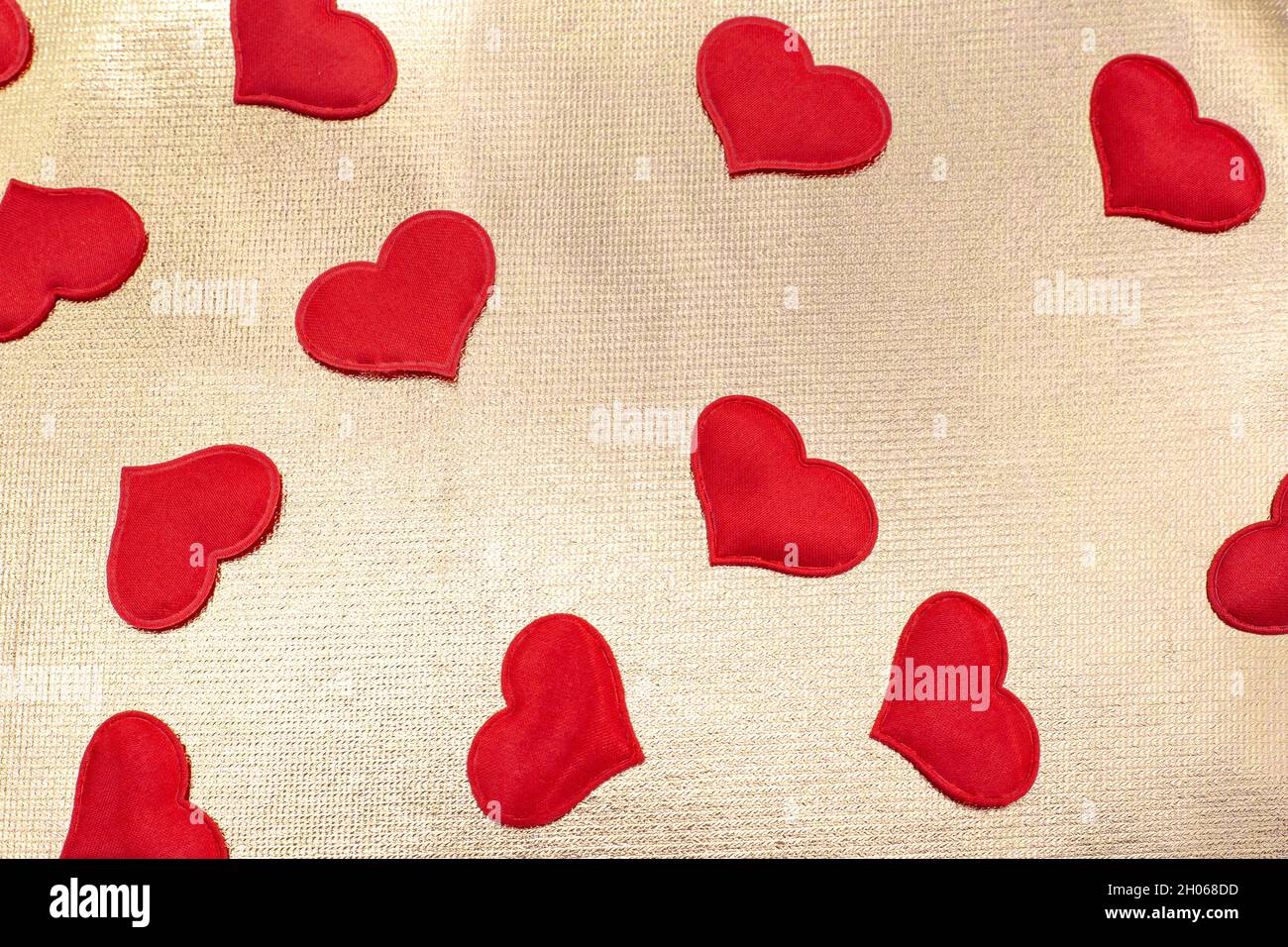 Shiny red golden hearts hi-res stock photography and images - Alamy