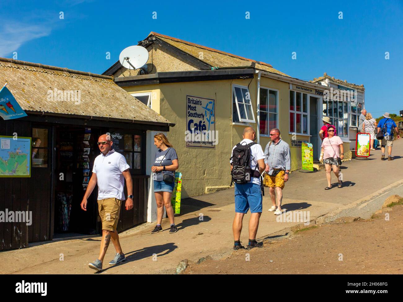 Tourists in summer outside Britain's most southerly cafe at Lizard Point on the south coast of Cornwall England UK Stock Photo