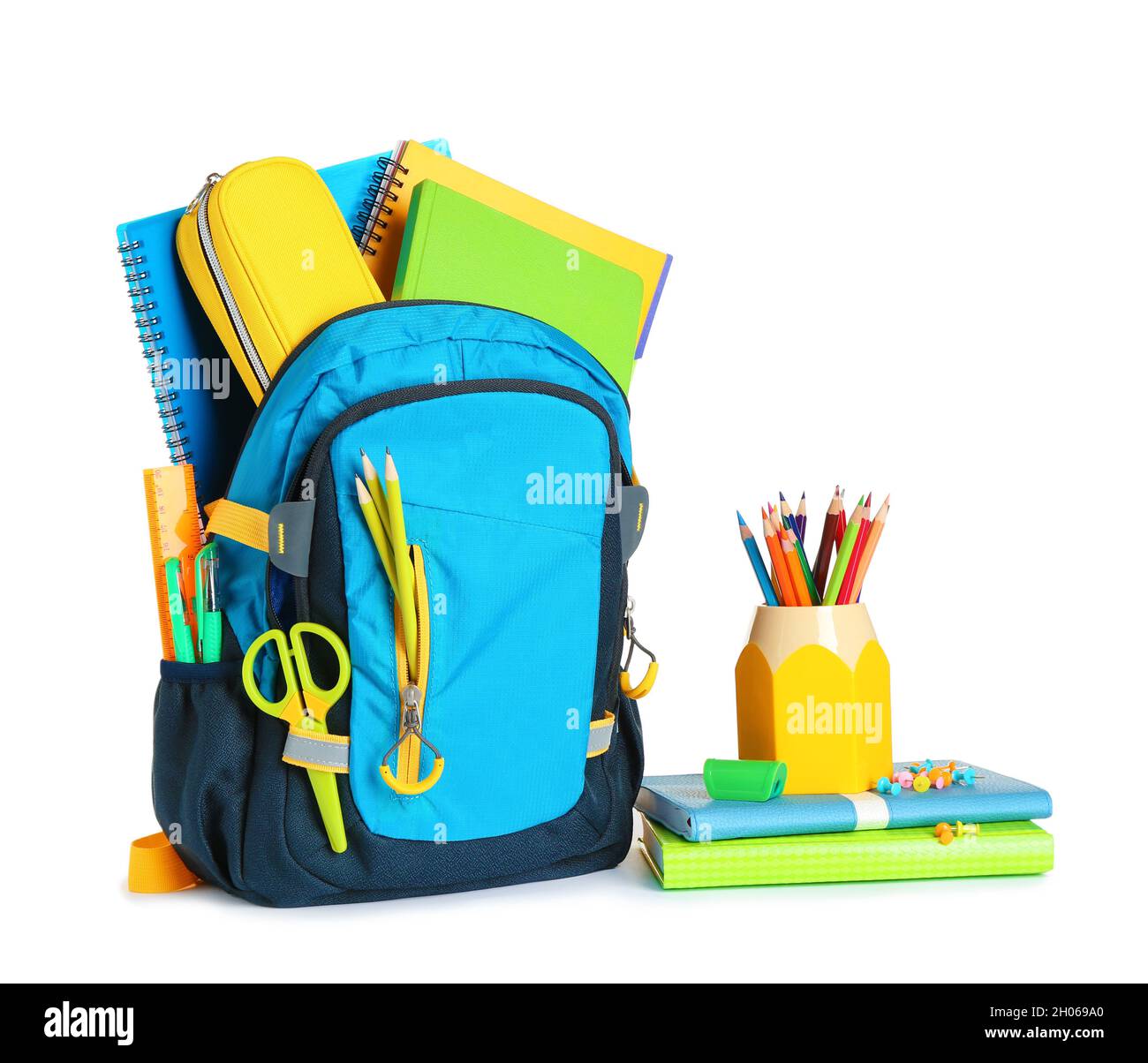 Backpack with school stationery on white background Stock Photo Alamy