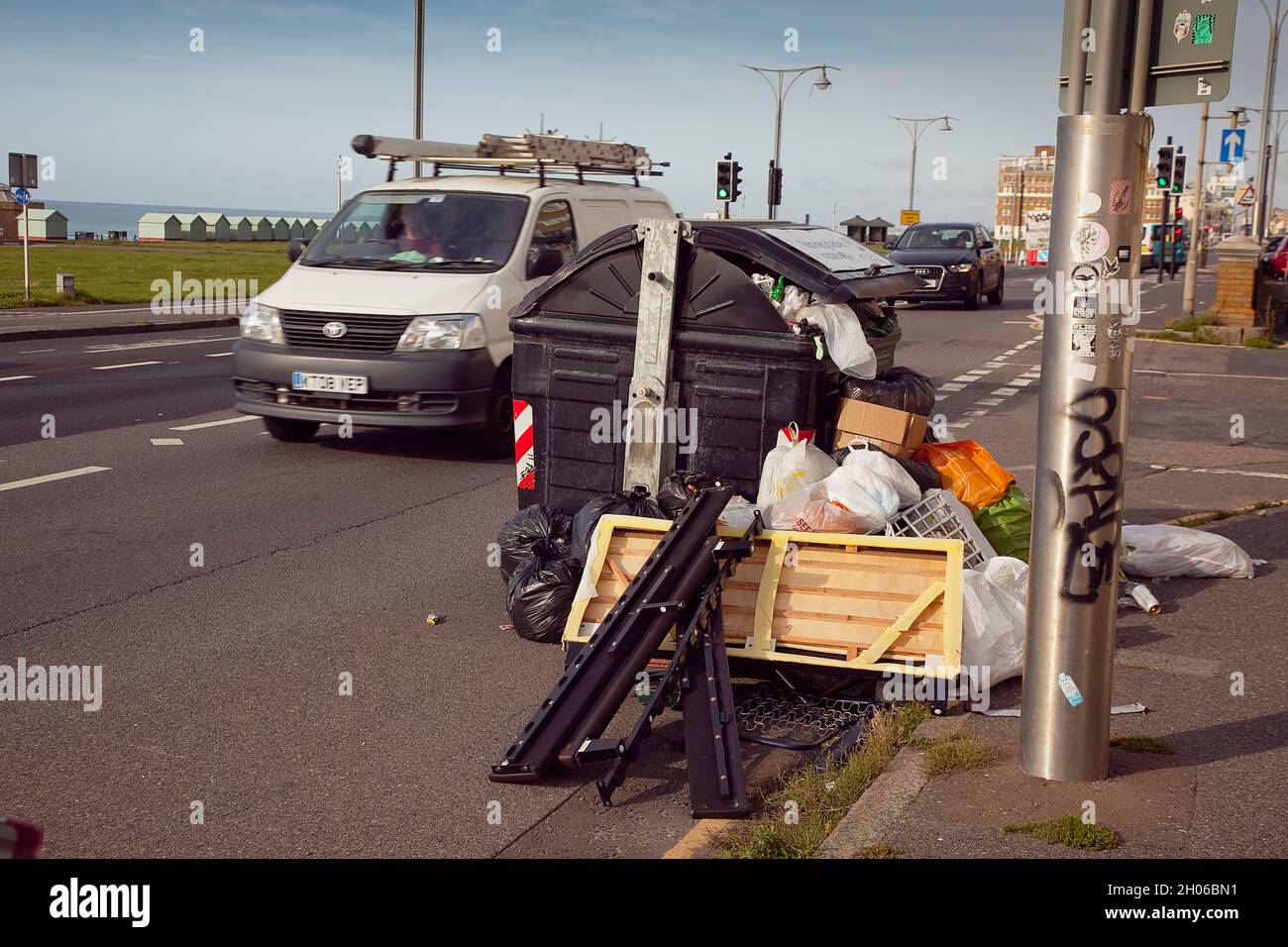 England, East Sussex, Hove, Overflowing bins during refuse collectors strike. Stock Photo