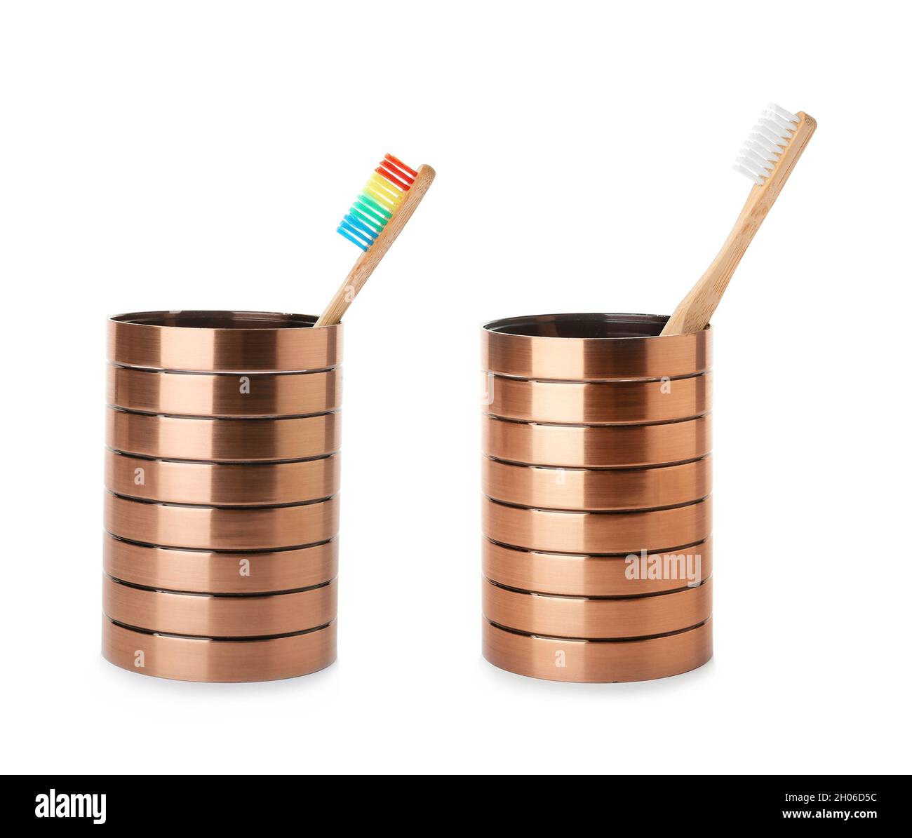 Set with bamboo toothbrushes in holders on white background Stock Photo ...