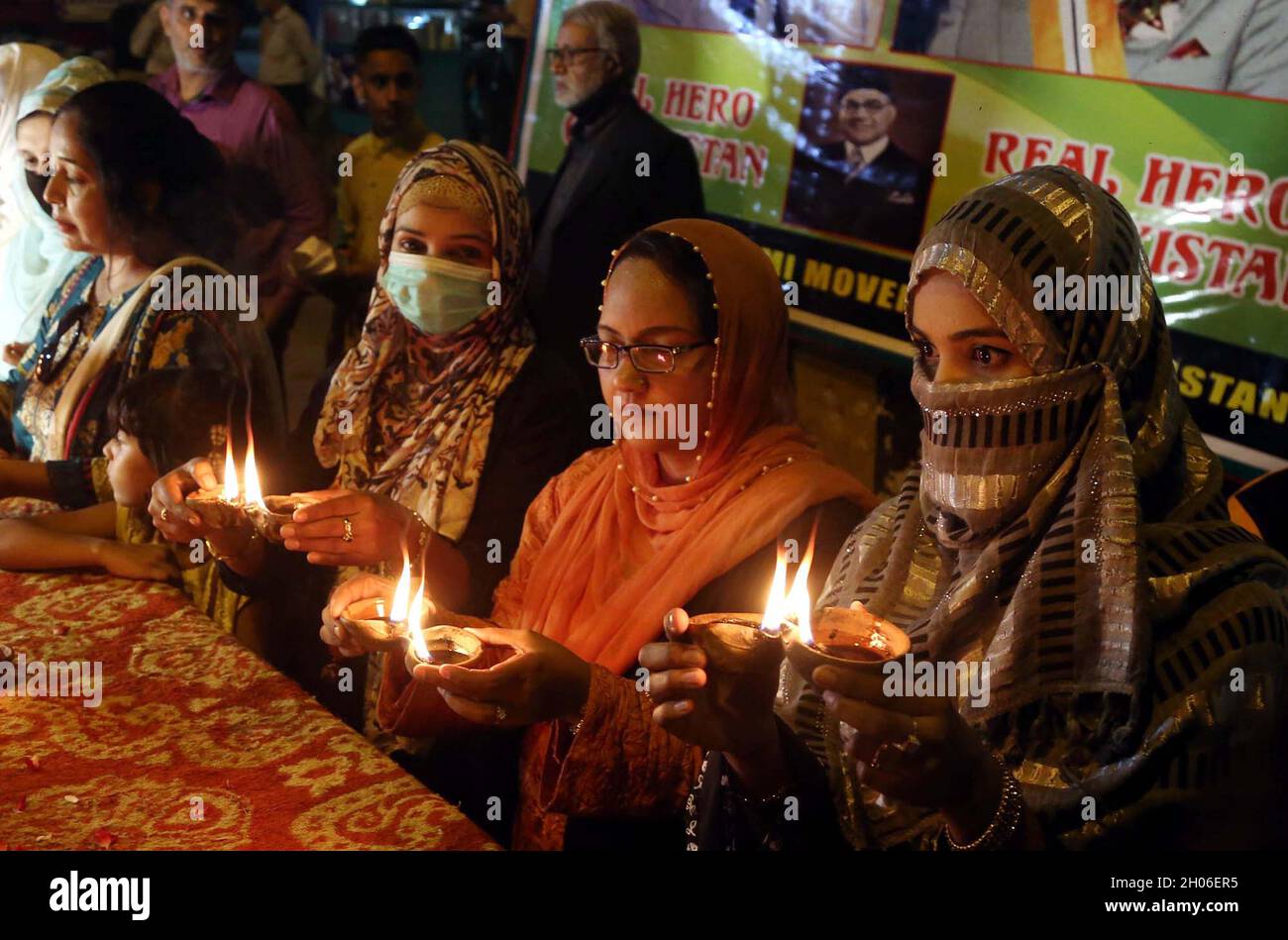 Members of All Baradari Qaumi Movement are enlightened candles to pay