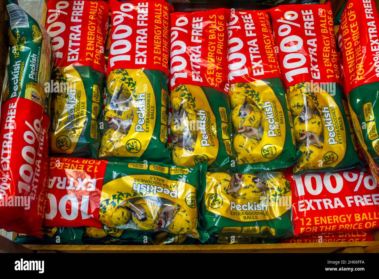 Garden Centre display of tubs of Peckish brand fat balls for attracting