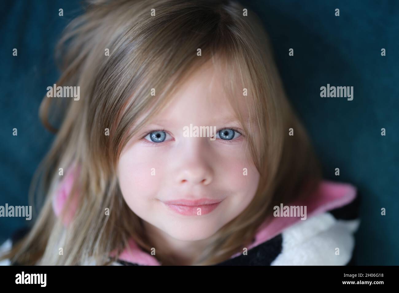 Portrait of beautiful cute little girl with blue eye Stock Photo - Alamy