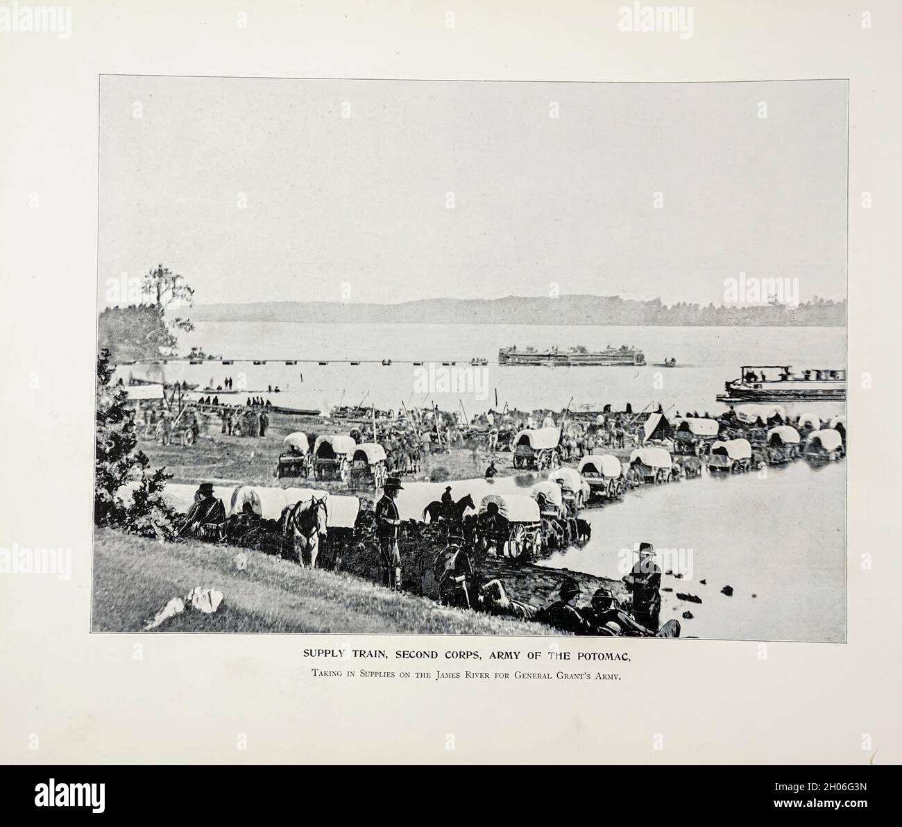 SUPPLY TRAIN, SECOND CORPS, ARMY OF THE POTOMAC Taking in Supplies on the James River for General Grant’s Army. from The American Civil War book and Grant album : 'art immortelles' : a portfolio of half-tone reproductions from rare and costly photographs designed to perpetuate the memory of General Ulysses S. Grant, depicting scenes and incidents in connection with the Civil War Published  in Boston and New York by W. H. Allen in 1894 Stock Photo