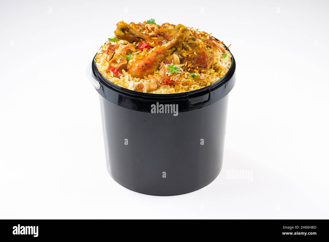 Chicken Bucket Biryani, Kerala dum chicken biryani arranged in a black bucket container with