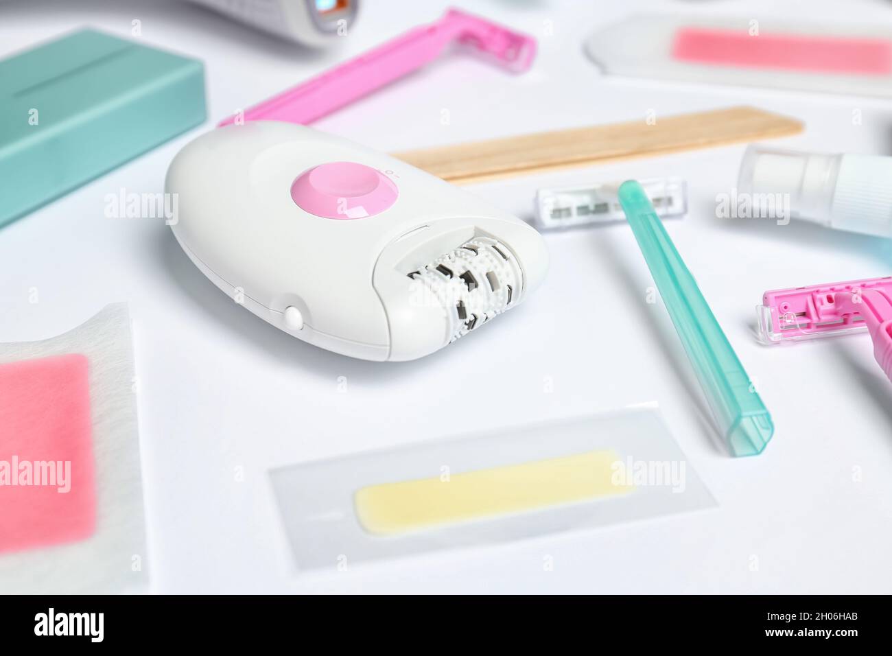 Set for epilation on white background Stock Photo - Alamy