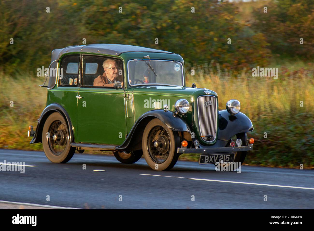 1935 30s thirties Austin Seven soft-top 747cc green black en-route to Southport Classic and Speed 2021, Victoria Park, Southport, UK Stock Photo
