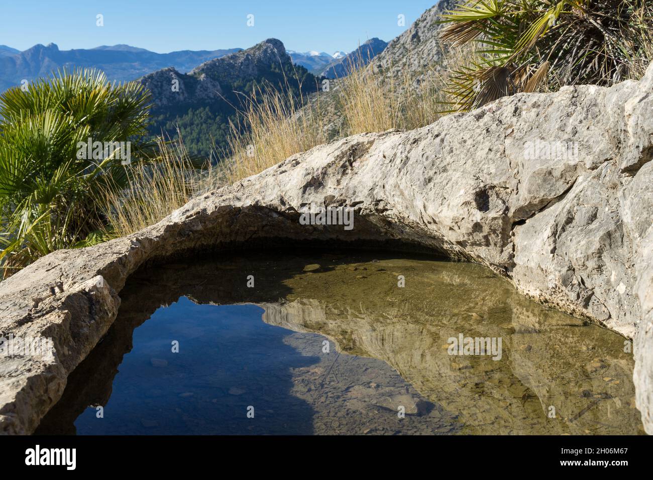 hike in the mountains rest at the water reservoir refreshment with