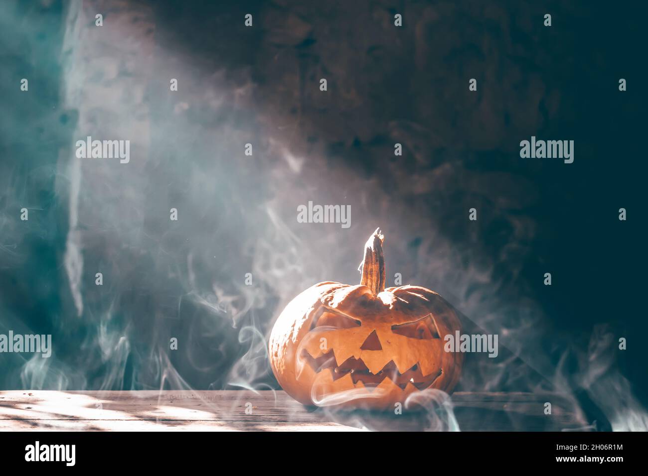 Jack O' Lanterns glowing in smoky fantasy night. Halloween background ...