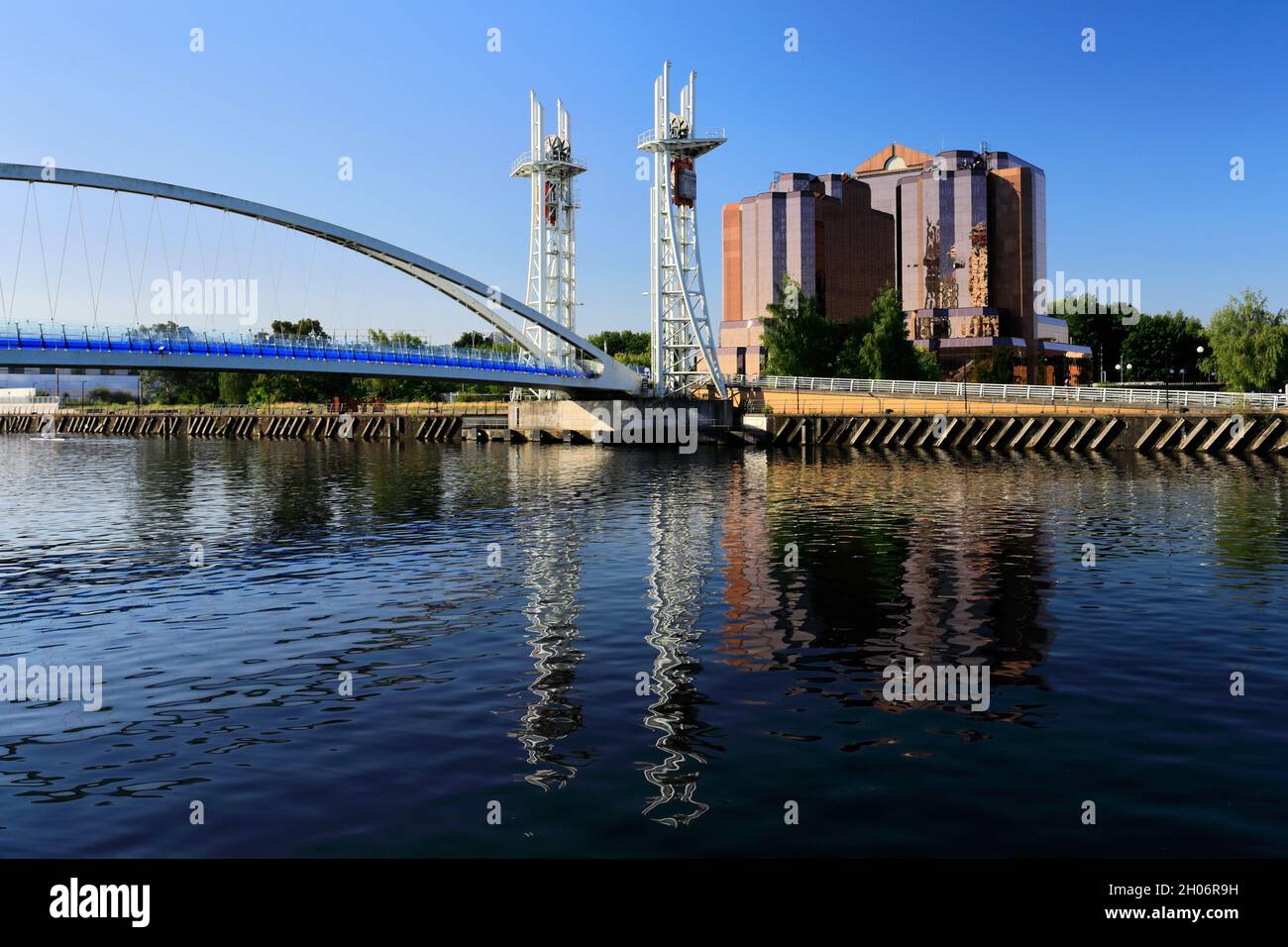 The Quay West building and Millennium Bridge, Trafford Wharf, Manchester, Lancashire, England Stock Photo