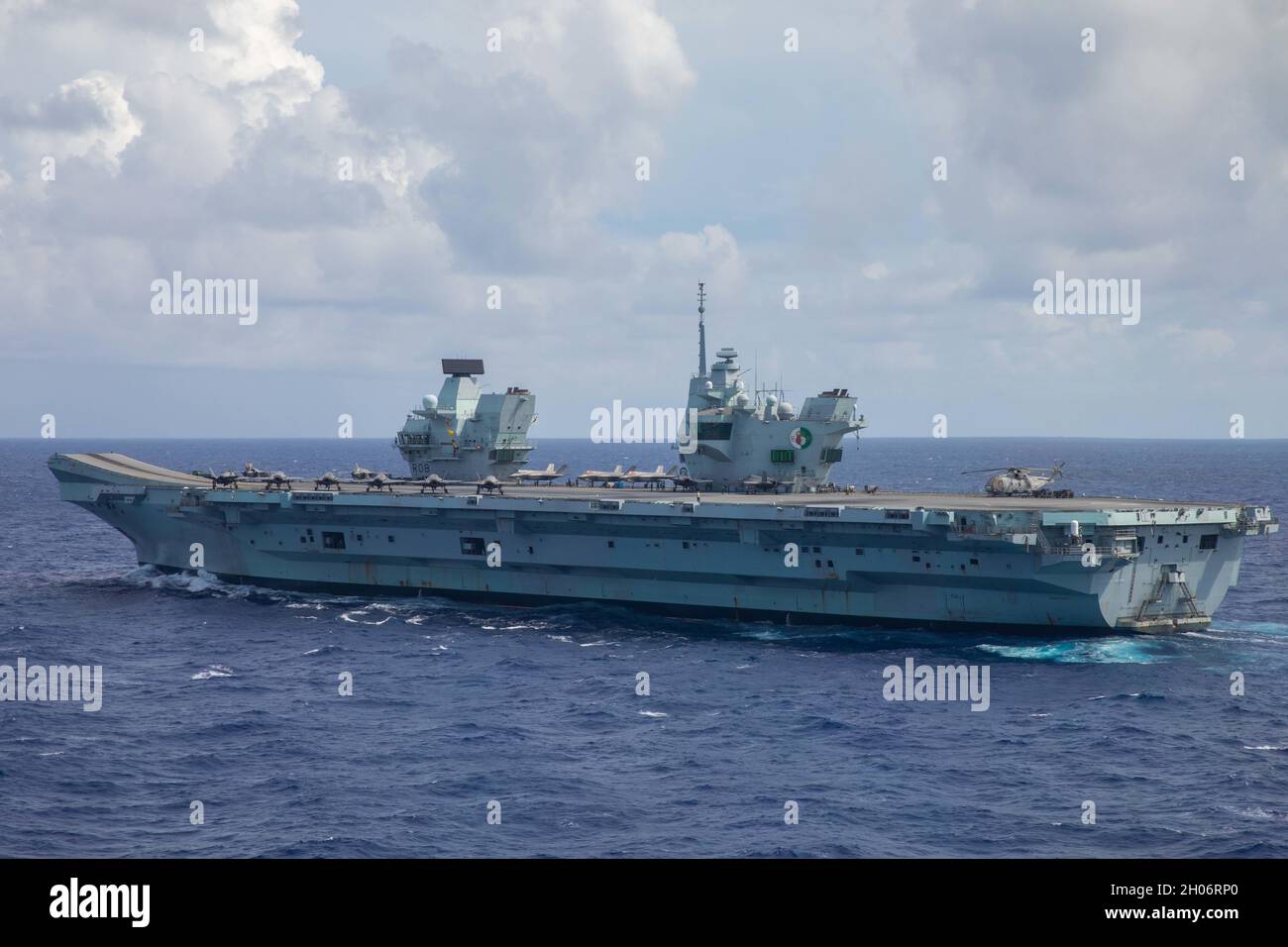 Philippine Sea, United States. 03 October, 2021. The British Royal Navy aircraft carrier HMS Queen Elizabeth, steams in formation during multi-national naval operations October 3, 2021 in the Philippine Sea.  Credit: MC3 Santiago Navarro/U.S. Navy/Alamy Live News Stock Photo