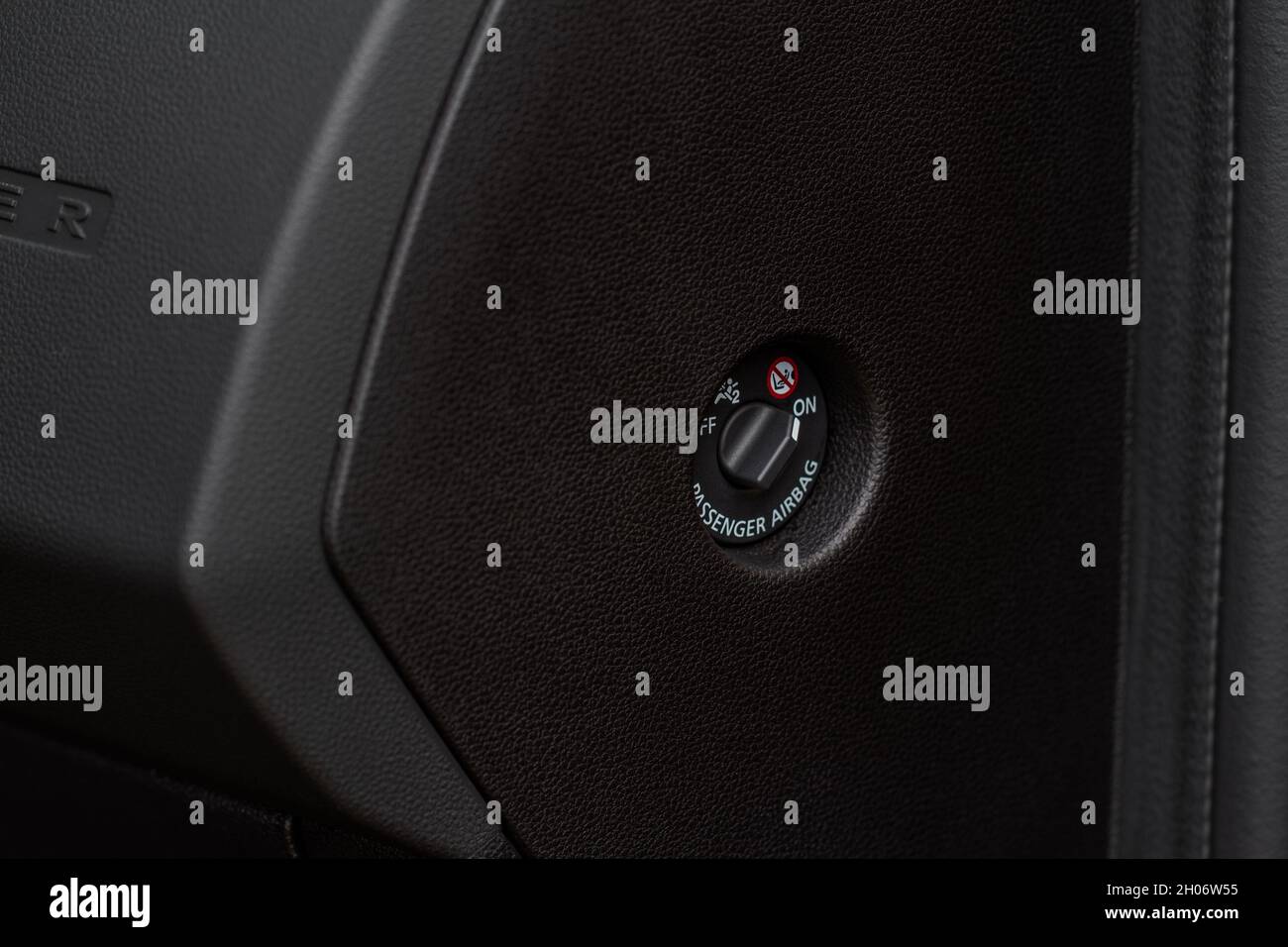 Front passenger airbag on and off switch close up view. Passenger