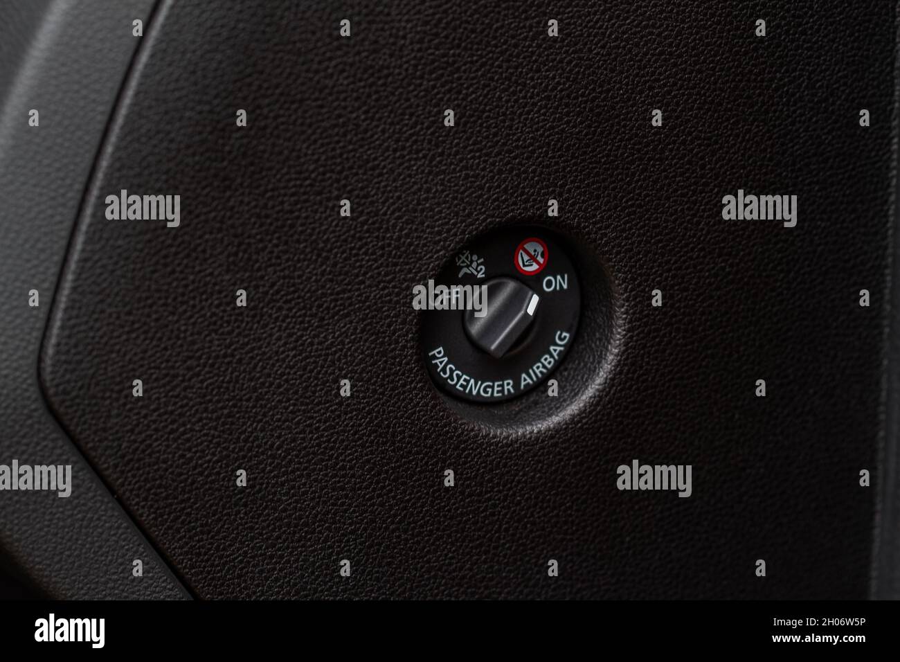 Front passenger airbag on and off switch close up view. Passenger