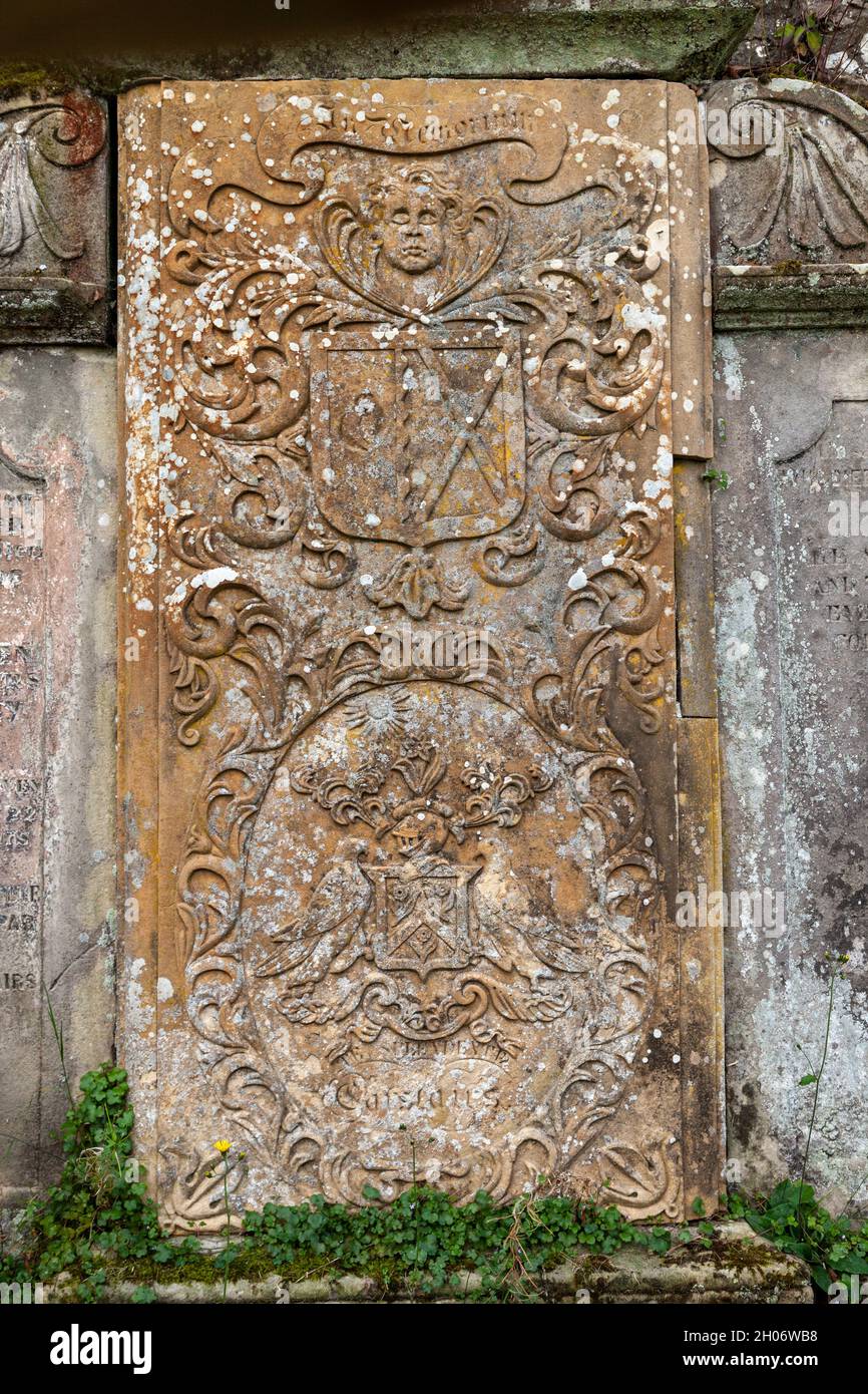 A very ornate headstone decorated with a family crest in Cupar Old